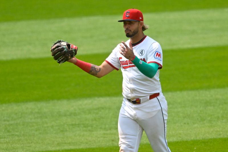 Jun 1, 2025; Cleveland, Ohio, USA; Cleveland Guardians shortstop Gabriel Arias (13) reacts after a ground ball broke the webbing of his glove in the seventh inning against the Los Angeles Angels at Progressive Field. Mandatory Credit: David Richard-Imagn Images