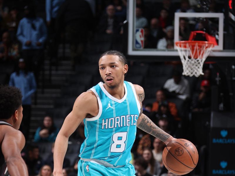 BROOKLYN, NY - FEBRUARY 10: Nick Smith Jr. #8 of the Charlotte Hornets dribbles the ball during the game against the Brooklyn Nets on February 10, 2025 at Barclays Center in Brooklyn, New York. NOTE TO USER: User expressly acknowledges and agrees that, by downloading and or using this Photograph, user is consenting to the terms and conditions of the Getty Images License Agreement. Mandatory Copyright Notice: Copyright 2025 NBAE (Photo by Nathaniel S. Butler/NBAE via Getty Images)