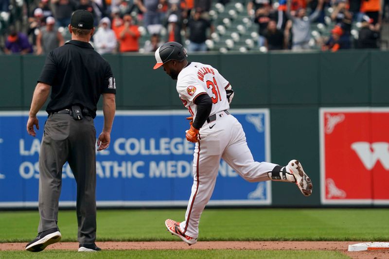 Apr 17, 2024; Baltimore, Maryland, USA; Baltimore Orioles outfielder Cedric Mullins (31) rounds the bases following his game winning two run home run in the ninth inning against the Minnesota Twins at Oriole Park at Camden Yards. Mandatory Credit: Mitch Stringer-USA TODAY Sports