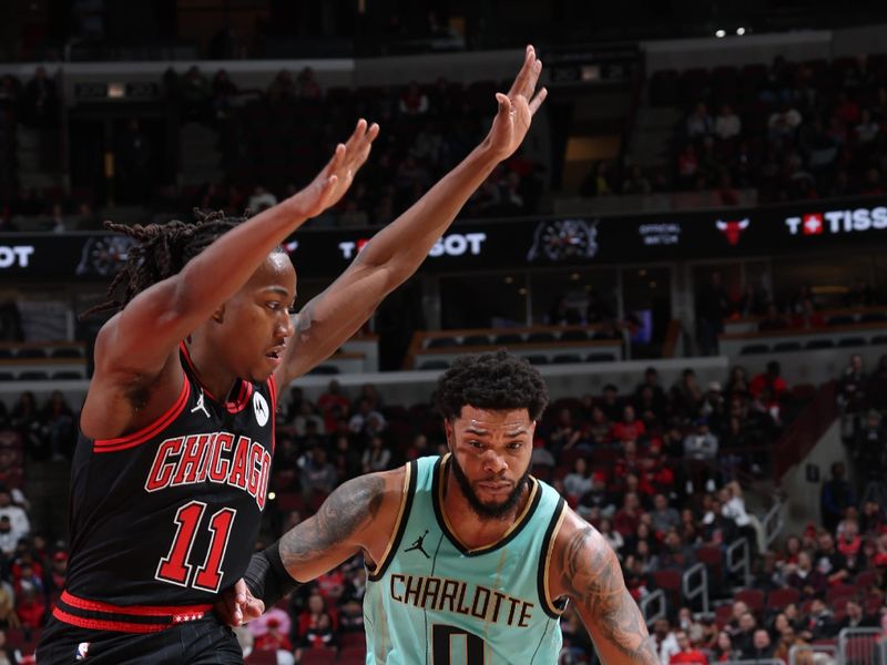 CHICAGO, IL - DECEMBER 13: Miles Bridges #0 of the Charlotte Hornets dribbles the ball during the game against the Chicago Bulls on December 13, 2024 at United Center in Chicago, Illinois. NOTE TO USER: User expressly acknowledges and agrees that, by downloading and or using this photograph, User is consenting to the terms and conditions of the Getty Images License Agreement. Mandatory Copyright Notice: Copyright 2024 NBAE (Photo by Jeff Haynes/NBAE via Getty Images)