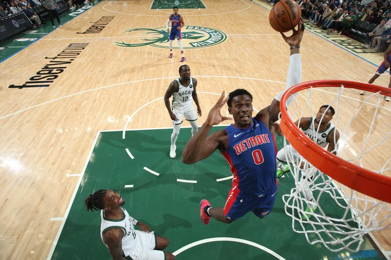 MILWAUKEE, WI - NOVEMBER 13: Jalen Duren #0 of the Detroit Pistons drives to the basket during the game against the Milwaukee Bucks on November 13, 2024 at the Fiserv Forum Center in Milwaukee, Wisconsin. NOTE TO USER: User expressly acknowledges and agrees that, by downloading and or using this Photograph, user is consenting to the terms and conditions of the Getty Images License Agreement. Mandatory Copyright Notice: Copyright 2024 NBAE (Photo by Gary Dineen/NBAE via Getty Images).