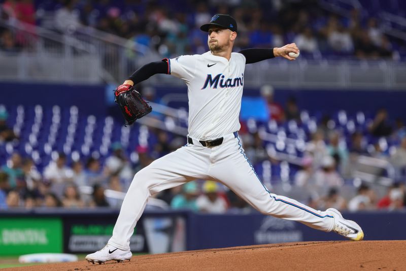 Jun 5, 2024; Miami, Florida, USA; Miami Marlins starting pitcher Braxton Garrett (29) delivers a pitch against the Tampa Bay Rays during the first inning at loanDepot Park. Mandatory Credit: Sam Navarro-USA TODAY Sports