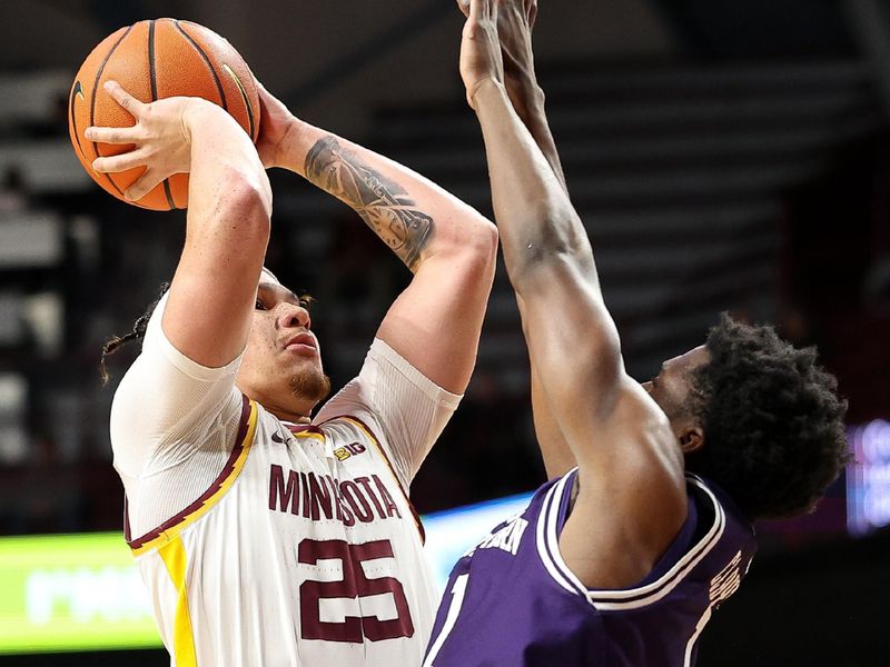 Feb 25, 2025; Minneapolis, Minnesota, USA; Minnesota Golden Gophers guard Lu'Cye Patterson (25) shoots as Northwestern Wildcats guard Jordan Clayton (11) defends during the first half at Williams Arena. Mandatory Credit: Matt Krohn-Imagn Images