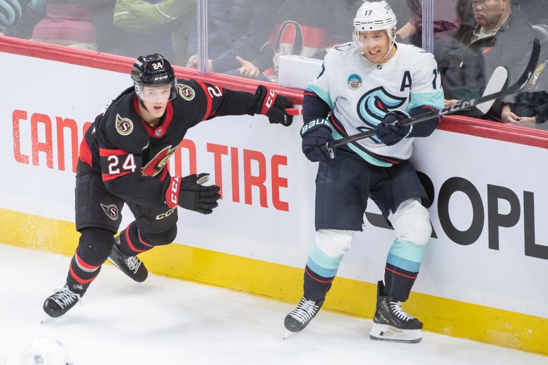 Nov 2, 2024; Ottawa, Ontario, CAN; Ottawa Senators  defenseman Jacob Bernard-Docker (24) and Seattle Kraken center Jaden Schwartz (17) follow the puck in the third period at the Canadian Tire Centre. Mandatory Credit: Marc DesRosiers-Imagn Images