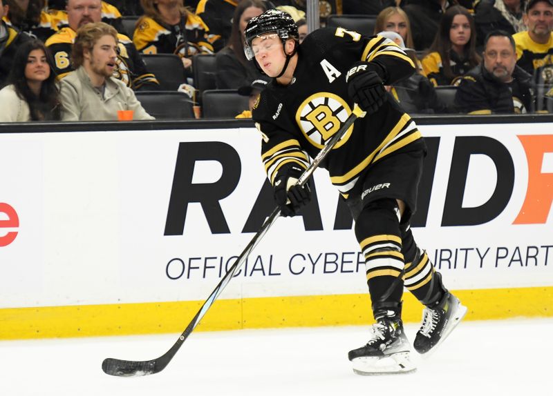 Apr 6, 2024; Boston, Massachusetts, USA; Boston Bruins defenseman Charlie McAvoy (73) shoots the puck during the third period against the Florida Panthers at TD Garden. Mandatory Credit: Bob DeChiara-USA TODAY Sports