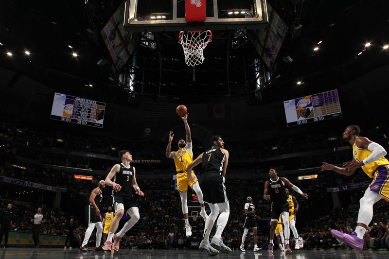 MEMPHIS, TN - MARCH 27: D'Angelo Russell #1 of the Los Angeles Lakers shoots the ball during the game against the Memphis Grizzlies on March 27, 2024 at FedExForum in Memphis, Tennessee. NOTE TO USER: User expressly acknowledges and agrees that, by downloading and or using this photograph, User is consenting to the terms and conditions of the Getty Images License Agreement. Mandatory Copyright Notice: Copyright 2024 NBAE (Photo by Joe Murphy/NBAE via Getty Images)