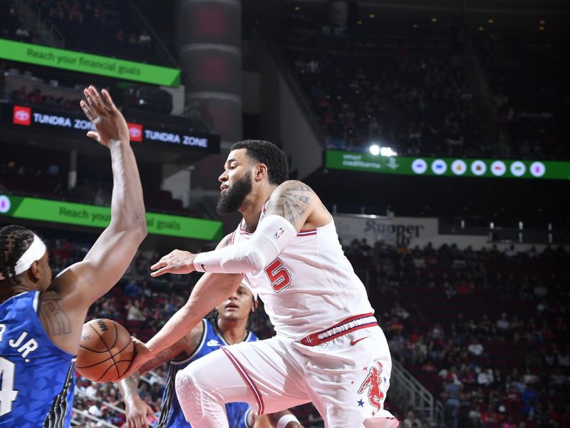 HOUSTON, TX - APRIL 9: Fred VanVleet #5 of the Houston Rockets drives to the basket during the game against the Orlando Magic on April 9, 2024 at the Toyota Center in Houston, Texas. NOTE TO USER: User expressly acknowledges and agrees that, by downloading and or using this photograph, User is consenting to the terms and conditions of the Getty Images License Agreement. Mandatory Copyright Notice: Copyright 2024 NBAE (Photo by Logan Riely/NBAE via Getty Images)