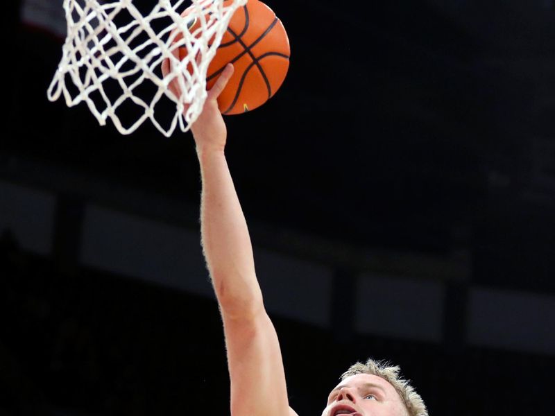 Feb 29, 2024; Columbus, Ohio, USA; Nebraska Cornhuskers forward Rienk Mast (51) shoots during the first half against the Ohio State Buckeyes at Value City Arena. Mandatory Credit: Joseph Maiorana-USA TODAY Sports