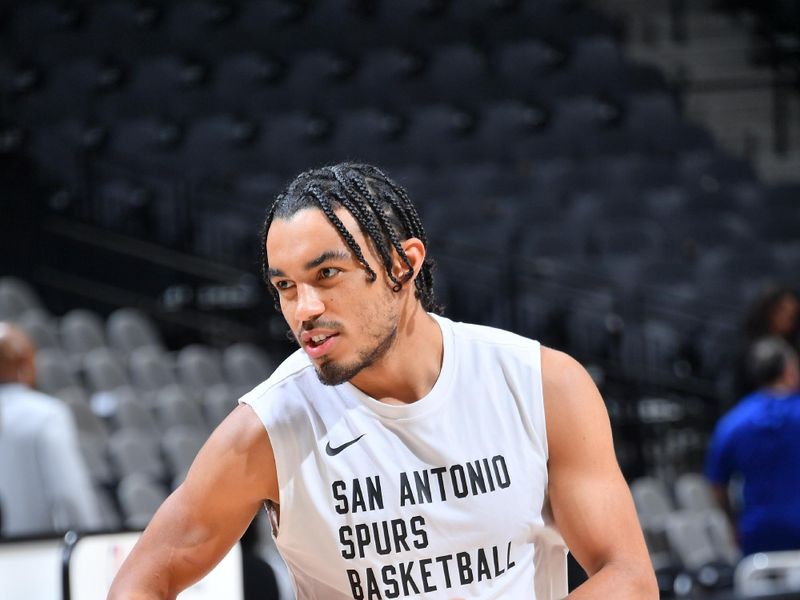 SAN ANTONIO, TX - MARCH 29: Tre Jones #33 of the San Antonio Spurs warms up before the game against the New York Knicks on March 29, 2024 at the Frost Bank Center in San Antonio, Texas. NOTE TO USER: User expressly acknowledges and agrees that, by downloading and or using this photograph, user is consenting to the terms and conditions of the Getty Images License Agreement. Mandatory Copyright Notice: Copyright 2024 NBAE (Photos by Michael Gonzales/NBAE via Getty Images)