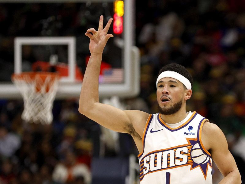 NEW ORLEANS, LOUISIANA - JANUARY 19: Devin Booker #1 of the Phoenix Suns reacts after scoring a three point basket during the third quarter of an NBA game against the New Orleans Pelicans at Smoothie King Center on January 19, 2024 in New Orleans, Louisiana. NOTE TO USER: User expressly acknowledges and agrees that, by downloading and or using this photograph, User is consenting to the terms and conditions of the Getty Images License Agreement. (Photo by Sean Gardner/Getty Images)