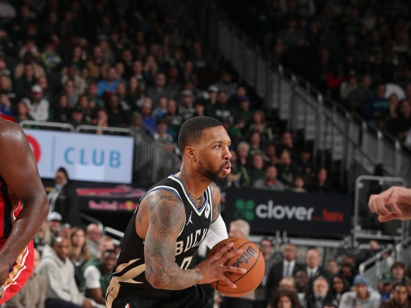 MILWAUKEE, WI - JANUARY 27:  Damian Lillard #0 of the Milwaukee Bucks passes the ball during the game on January 27, 2024 at the Fiserv Forum Center in Milwaukee, Wisconsin. NOTE TO USER: User expressly acknowledges and agrees that, by downloading and or using this Photograph, user is consenting to the terms and conditions of the Getty Images License Agreement. Mandatory Copyright Notice: Copyright 2024 NBAE (Photo by Gary Dineen/NBAE via Getty Images).