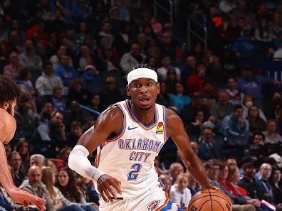 OKLAHOMA CITY, OK - DECEMBER 18:  Shai Gilgeous-Alexander #2 of the Oklahoma City Thunder handles the ball during the game against the Memphis Grizzlies on December 18, 2023 at Paycom Arena in Oklahoma City, Oklahoma. NOTE TO USER: User expressly acknowledges and agrees that, by downloading and or using this photograph, User is consenting to the terms and conditions of the Getty Images License Agreement. Mandatory Copyright Notice: Copyright 2023 NBAE (Photo by Zach Beeker/NBAE via Getty Images)