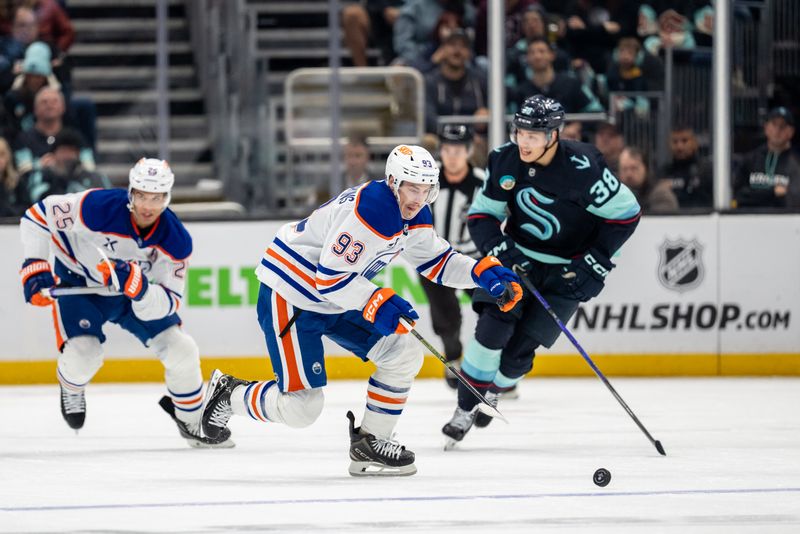 Oct 25, 2025; Seattle, Washington, USA; Edmonton Oilers forward Ryan Nugent-Hopkins (93) skates against  forward Jani Nyman (38) during the first period at Climate Pledge Arena. Mandatory Credit: Stephen Brashear-Imagn Images