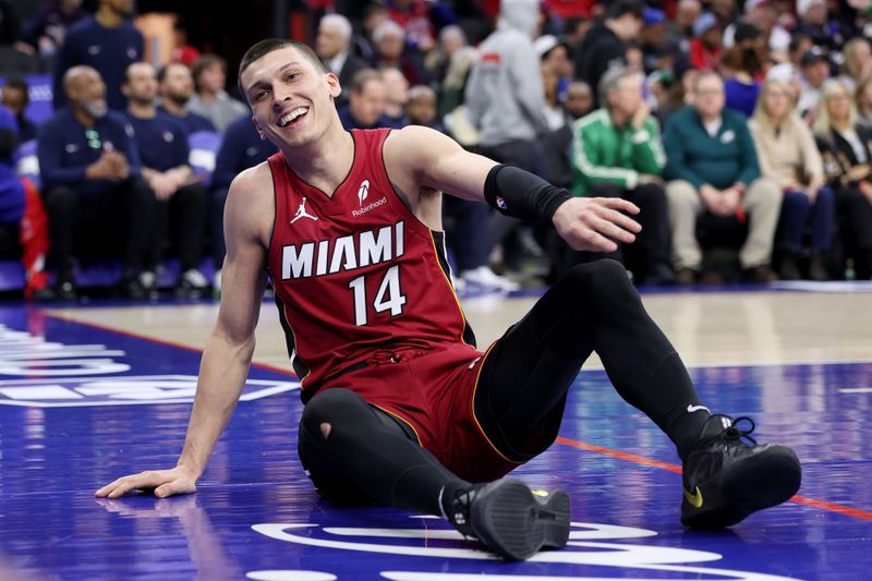 PHILADELPHIA, PENNSYLVANIA - FEBRUARY 05: Tyler Herro #14 of the Miami Heat reacts after falling on the court during the second half against the Philadelphia 76ers at the Wells Fargo Center on February 05, 2025 in Philadelphia, Pennsylvania. NOTE TO USER: User expressly acknowledges and agrees that, by downloading and or using this photograph, User is consenting to the terms and conditions of the Getty Images License Agreement. (Photo by Emilee Chinn/Getty Images)