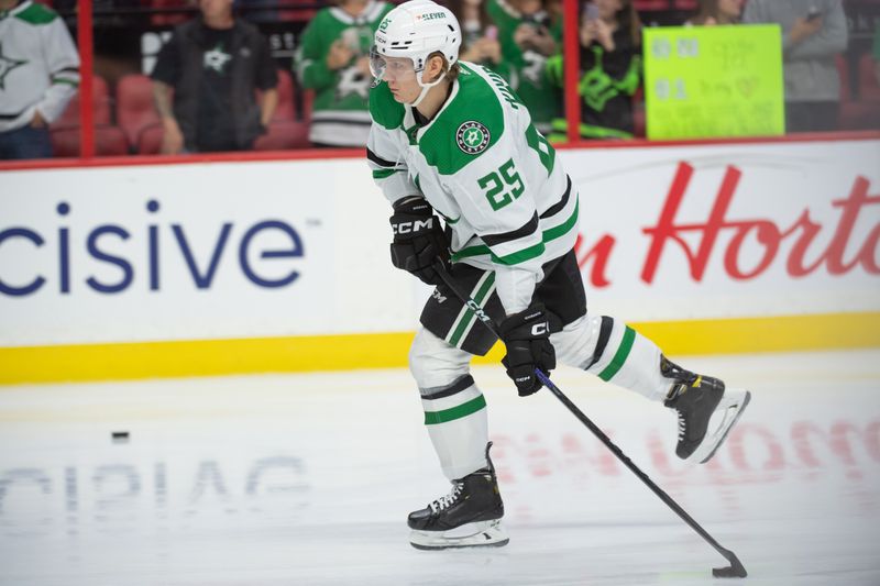 Oct 24, 2022; Ottawa, Ontario, CAN; Dallas Stars left wing Joel Kiviranta (25) shoots during warm ups prior to start of a game against the Ottawa Senators at the Canadian Tire Centre. Mandatory Credit: Marc DesRosiers-USA TODAY Sports