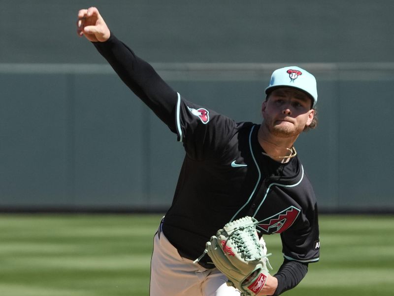 Mar 11, 2024; Salt River Pima-Maricopa, Arizona, USA; Arizona Diamondbacks starting pitcher Ryne Nelson (19) throws against the Oakland Athletics in the first inning at Salt River Fields at Talking Stick. Mandatory Credit: Rick Scuteri-USA TODAY Sports