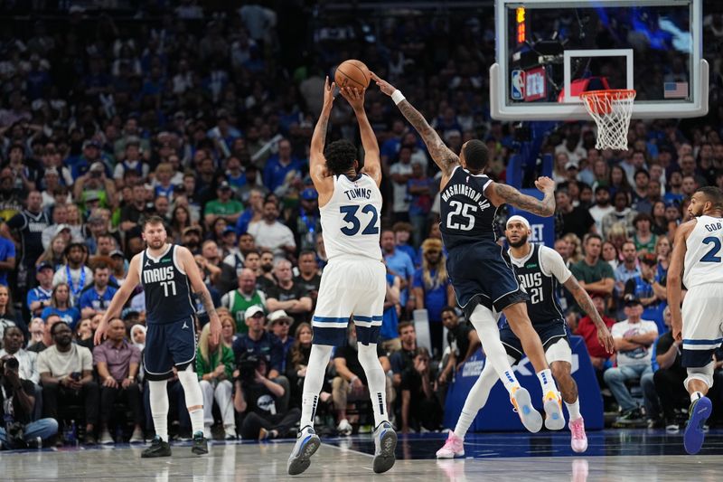 DALLAS, TX - MAY 28: Karl-Anthony Towns #32 of the Minnesota Timberwolves shoots the ball during the game against the Dallas Mavericks during Game 4 of the Western Conference Finals of the 2024 NBA Playoffs on May 28, 2024 at the American Airlines Center in Dallas, Texas. NOTE TO USER: User expressly acknowledges and agrees that, by downloading and or using this photograph, User is consenting to the terms and conditions of the Getty Images License Agreement. Mandatory Copyright Notice: Copyright 2024 NBAE (Photo by Glenn James/NBAE via Getty Images)
