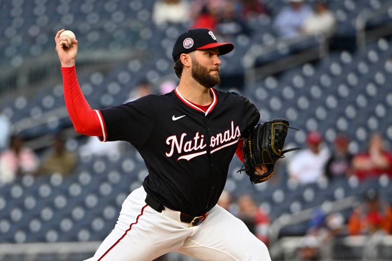 May 22, 2025; Washington, District of Columbia, USA; Washington Nationals pitcher Trevor Williams (32) throws to the Atlanta Braves during the second inning at Nationals Park. Mandatory Credit: Brad Mills-Imagn Images
