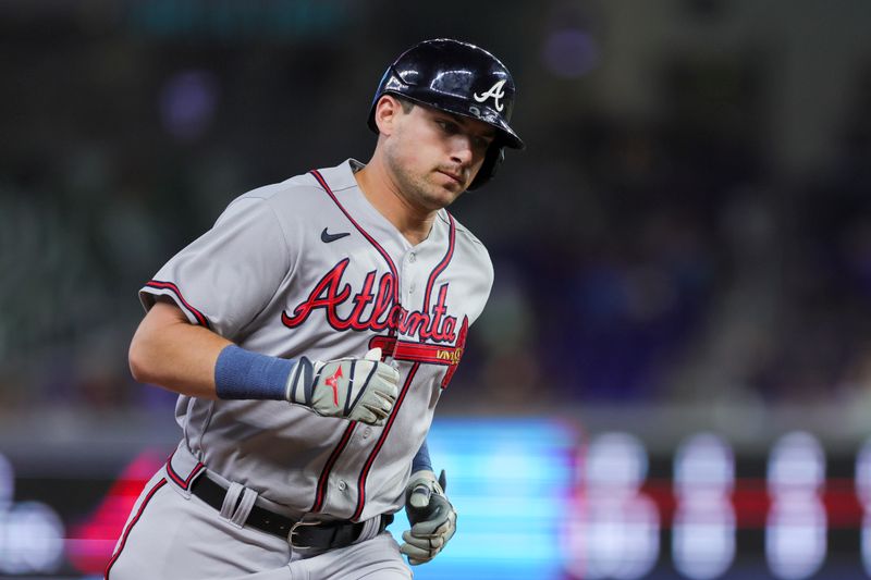 Sep 16, 2023; Miami, Florida, USA; Atlanta Braves third baseman Austin Riley (27) circles the bases after hitting a home run against the Miami Marlins during the first inning at loanDepot Park. Mandatory Credit: Sam Navarro-USA TODAY Sports