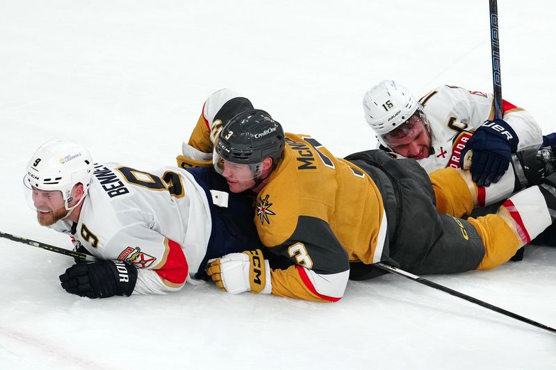 Jan 26, 2025; Las Vegas, Nevada, USA; Vegas Golden Knights defenseman Brayden McNabb (3) falls on Florida Panthers center Sam Bennett (9) and Florida Panthers center Aleksander Barkov (16) during the third period at T-Mobile Arena. Mandatory Credit: Stephen R. Sylvanie-Imagn Images