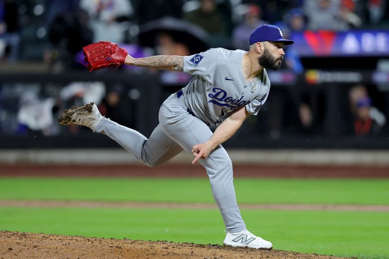 May 23, 2025; New York City, New York, USA; Los Angeles Dodgers relief pitcher Tanner Scott (66) pitches against the New York Mets during the ninth inning at Citi Field. Mandatory Credit: Brad Penner-Imagn Images