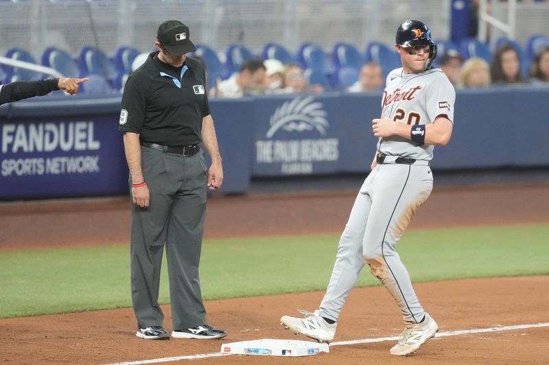 Sep 14, 2025; Miami, Florida, USA;  Detroit Tigers first baseman Spencer Torkelson (20) advances to third base in the ninth inning on a base hit against the Miami Marlins at loanDepot Park. Mandatory Credit: Jim Rassol-Imagn Images