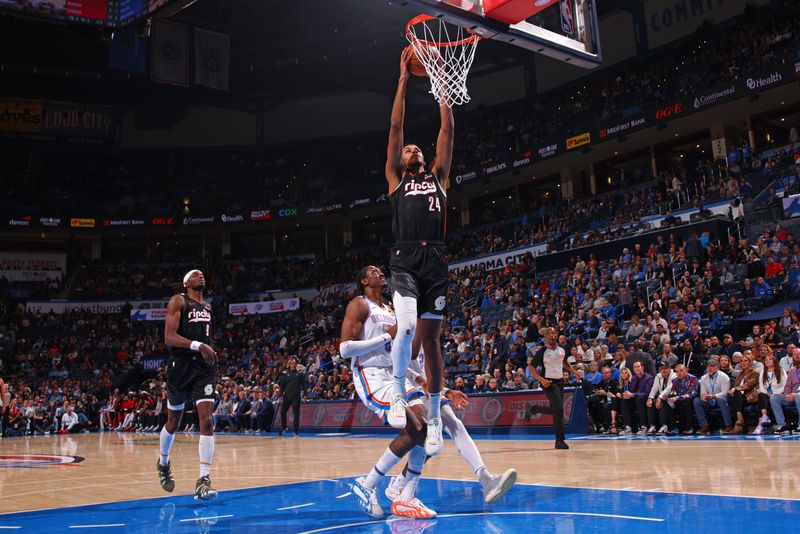 OKLAHOMA CITY, OK - NOVEMBER 20: Kris Murray #24 of the Portland Trail Blazers drives to the basket during the game against the Oklahoma City Thunder on November 20, 2024 at Paycom Center in Oklahoma City, Oklahoma. NOTE TO USER: User expressly acknowledges and agrees that, by downloading and or using this photograph, User is consenting to the terms and conditions of the Getty Images License Agreement. Mandatory Copyright Notice: Copyright 2024 NBAE (Photo by Zach Beeker/NBAE via Getty Images)