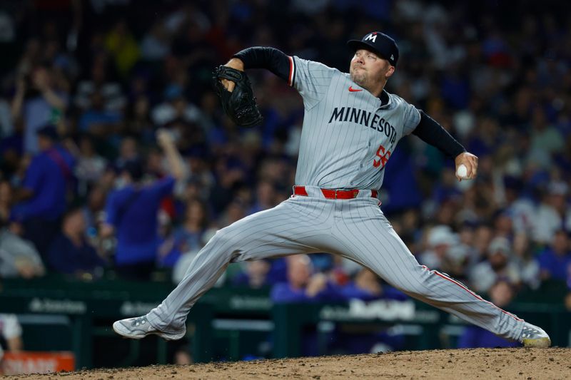 Aug 5, 2024; Chicago, Illinois, USA; Minnesota Twins relief pitcher Caleb Thielbar (56) delivers a pitch against the Chicago Cubs during the sixth inning at Wrigley Field. Mandatory Credit: Kamil Krzaczynski-USA TODAY Sports