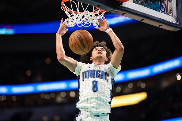 WASHINGTON, DC - DECEMBER 26: Anthony Black #0 of the Orlando Magic dunks the ball against the Washington Wizards during the first half at Capital One Arena on December 26, 2023 in Washington, DC. NOTE TO USER: User expressly acknowledges and agrees that, by downloading and or using this photograph, User is consenting to the terms and conditions of the Getty Images License Agreement. (Photo by Scott Taetsch/Getty Images)