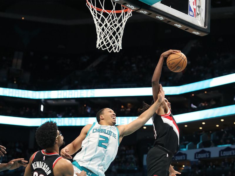 CHARLOTTE, NC - APRIL 3:  Jabari Walker #34 of the Portland Trail Blazers grabs a rebound during the game against the Charlotte Hornets  on April 3, 2024 at Spectrum Center in Charlotte, North Carolina. NOTE TO USER: User expressly acknowledges and agrees that, by downloading and or using this photograph, User is consenting to the terms and conditions of the Getty Images License Agreement.  Mandatory Copyright Notice:  Copyright 2024 NBAE (Photo by Brock Williams-Smith/NBAE via Getty Images)