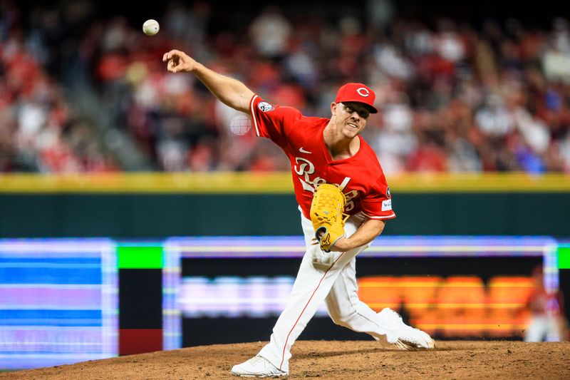 Apr 12, 2025; Cincinnati, Ohio, USA; Cincinnati Reds relief pitcher Emilio Pagan (15) pitches against the Pittsburgh Pirates in the ninth inning at Great American Ball Park. Mandatory Credit: Katie Stratman-Imagn Images
