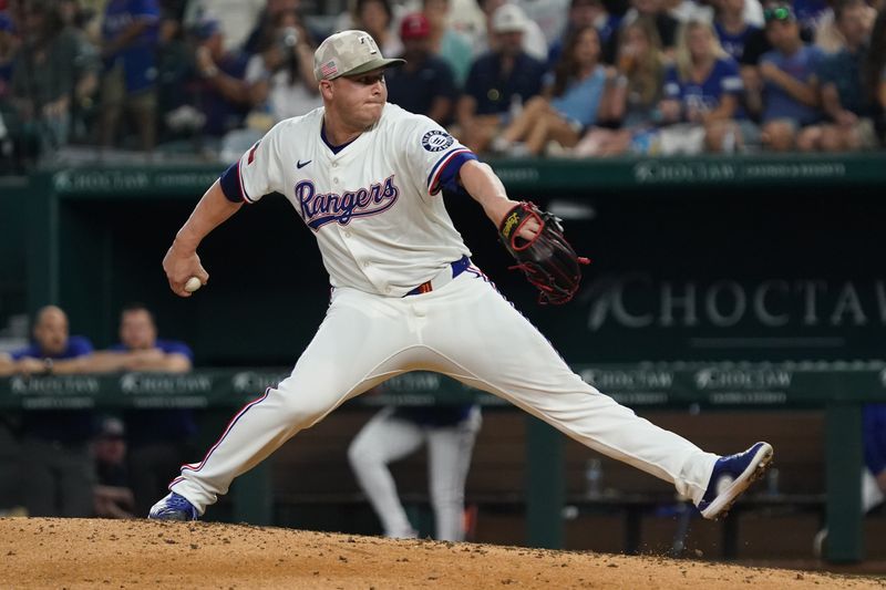 May 17, 2025; Arlington, Texas, USA; Texas Rangers pitcher Jacob Webb (71) throws to the plate during the seventh inning against the Houston Astros at Globe Life Field. Mandatory Credit: Raymond Carlin III-Imagn Images