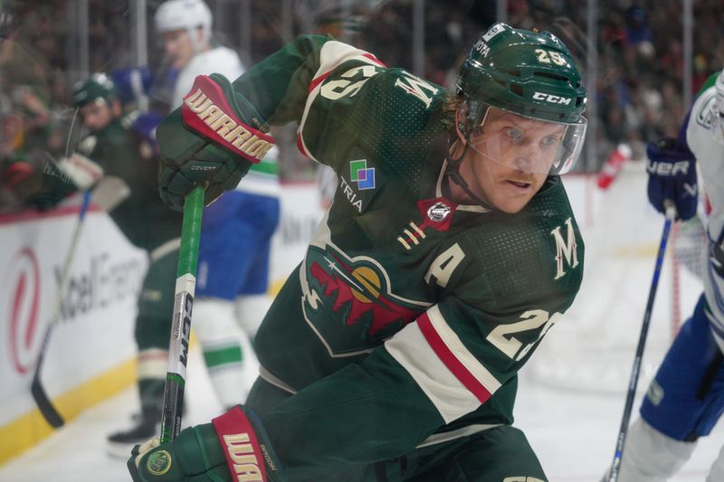 Feb 19, 2024; Saint Paul, Minnesota, USA; Minnesota Wild defenseman Jonas Brodin (25) in action against the Vancouver Canucks in the second period at Xcel Energy Center. Mandatory Credit: Matt Blewett-USA TODAY Sports