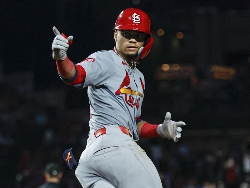 Aug 1, 2024; Chicago, Illinois, USA; St. Louis Cardinals shortstop Masyn Winn (0) celebrates after hitting a two-run home run against the Chicago Cubs during the seventh inning at Wrigley Field. Mandatory Credit: Kamil Krzaczynski-USA TODAY Sports