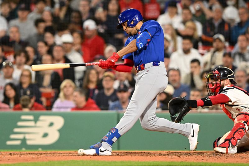 Apr 28, 2024; Boston, Massachusetts, USA; Chicago Cubs third baseman Christopher Morel (5) fouls the ball off of his foot during the fourth inning of a game against the Boston Red Sox at Fenway Park. Mandatory Credit: Brian Fluharty-USA TODAY Sports