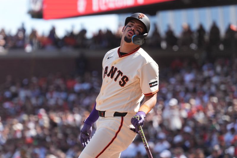 Mar 27, 2026; San Francisco, California, USA; San Francisco Giants shortstop Willy Adames (2) reacts after fouling a ball during the fourth inning against the New York Yankees at Oracle Park. Mandatory Credit: Darren Yamashita-Imagn Images