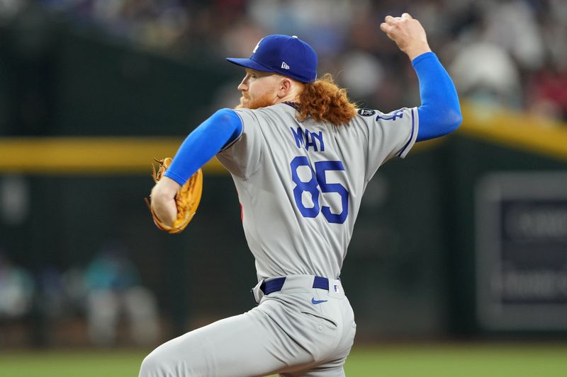 May 10, 2025; Phoenix, Arizona, USA; Los Angeles Dodgers pitcher Dustin May (85) pitches against the Arizona Diamondbacks during the first inning at Chase Field. Mandatory Credit: Joe Camporeale-Imagn Images