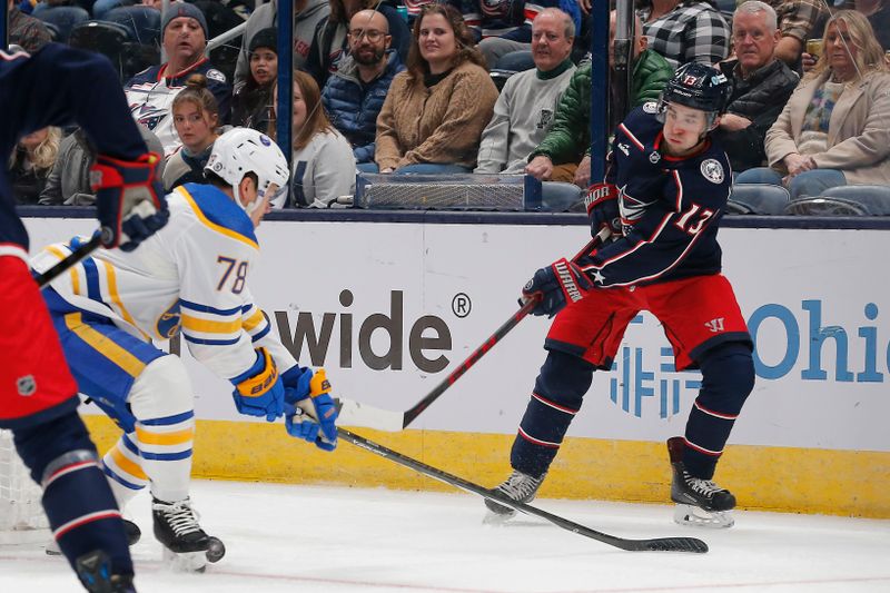 Feb 23, 2024; Columbus, Ohio, USA; Buffalo Sabres defenseman Jacob Bryson (78) blocks the pass attemp of Columbus Blue Jackets left wing Johnny Gaudreau (13) during the first period at Nationwide Arena. Mandatory Credit: Russell LaBounty-USA TODAY Sports