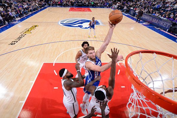 SACRAMENTO, CA - DECEMBER 11: Domantas Sabonis #10 of the Sacramento Kings drives to the basket during the game against the Brooklyn Nets on December 11, 2023 at Golden 1 Center in Sacramento, California. NOTE TO USER: User expressly acknowledges and agrees that, by downloading and or using this Photograph, user is consenting to the terms and conditions of the Getty Images License Agreement. Mandatory Copyright Notice: Copyright 2023 NBAE (Photo by Rocky Widner/NBAE via Getty Images)