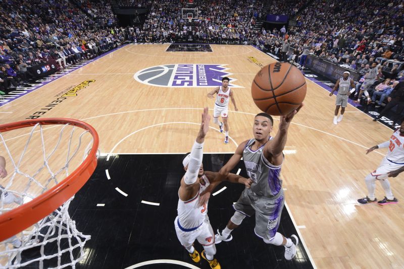 SACRAMENTO, CA - MARCH 9: Keegan Murray #13 of the Sacramento Kings drives to the basket during the game against the New York Knicks on March 9, 2023 at Golden 1 Center in Sacramento, California. NOTE TO USER: User expressly acknowledges and agrees that, by downloading and or using this Photograph, user is consenting to the terms and conditions of the Getty Images License Agreement. Mandatory Copyright Notice: Copyright 2023 NBAE (Photo by Rocky Widner/NBAE via Getty Images)