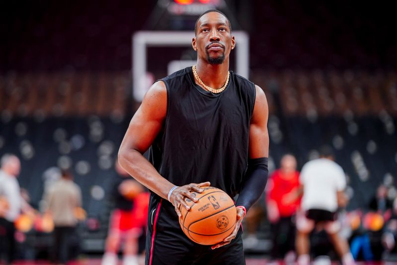 TORONTO, CANADA - JANUARY 17: Bam Adebayo #13 of the Miami Heat warms up before the game against the Toronto Raptors on January 17, 2024 at the Scotiabank Arena in Toronto, Ontario, Canada.  NOTE TO USER: User expressly acknowledges and agrees that, by downloading and or using this Photograph, user is consenting to the terms and conditions of the Getty Images License Agreement.  Mandatory Copyright Notice: Copyright 2024 NBAE (Photo by Mark Blinch/NBAE via Getty Images)