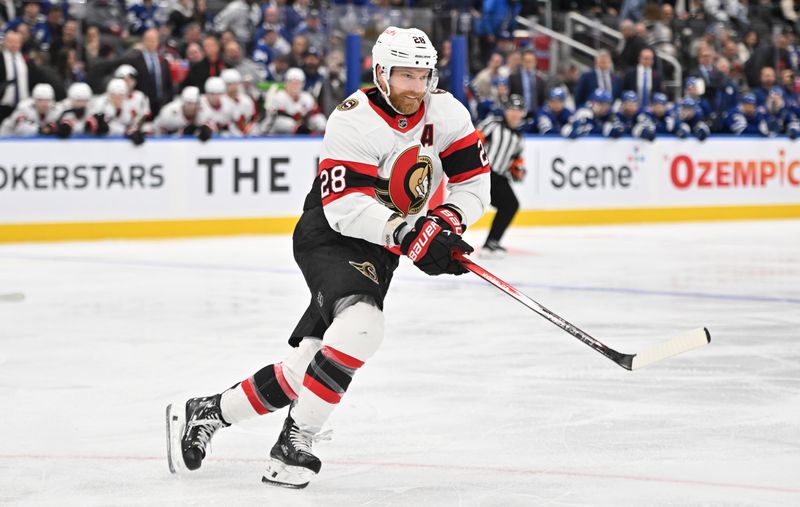 Nov 8, 2023; Toronto, Ontario, CAN; Ottawa Senators forward Claude Girioux (28) pursues the play against the Toronto Maple Leafs in the third period at Scotiabank Arena. Mandatory Credit: Dan Hamilton-USA TODAY Sports