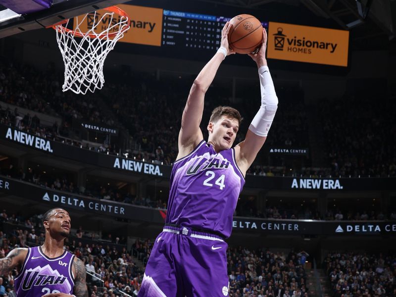 SALT LAKE CITY, UT - FEBRUARY 6: Walker Kessler #24 of the Utah Jazz rebounds the ball during the game against the Oklahoma City Thunder on February 6, 2024 at Delta Center in Salt Lake City, Utah. NOTE TO USER: User expressly acknowledges and agrees that, by downloading and or using this Photograph, User is consenting to the terms and conditions of the Getty Images License Agreement. Mandatory Copyright Notice: Copyright 2024 NBAE (Photo by Melissa Majchrzak/NBAE via Getty Images)