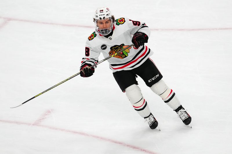 Apr 16, 2024; Las Vegas, Nevada, USA; Chicago Blackhawks center Connor Bedard (98) skates against the Vegas Golden Knights during the third period at T-Mobile Arena. Mandatory Credit: Stephen R. Sylvanie-USA TODAY Sports