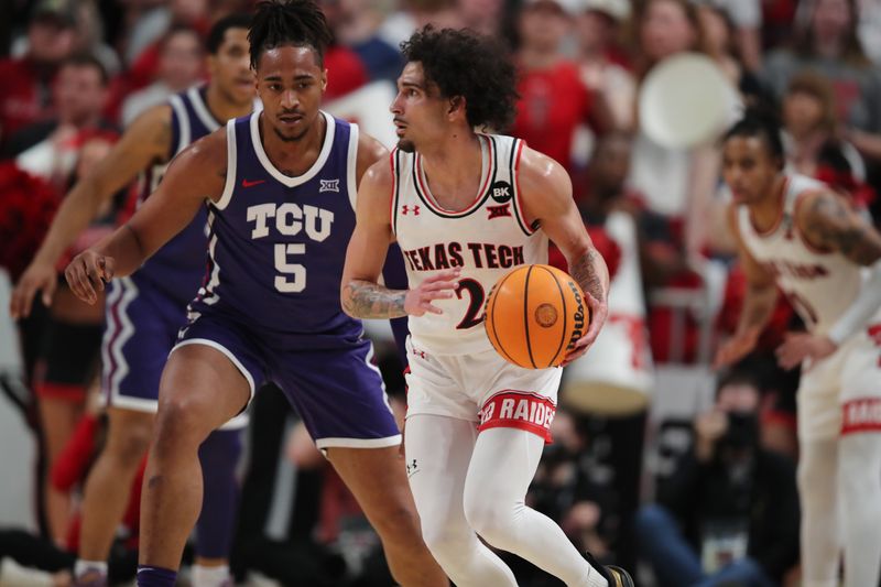 Feb 20, 2024; Lubbock, Texas, USA;  Texas Tech Red Raiders guard Pop Isaacs (2) dribbles the ball against TCU Horned Frogs forward Chuck O   Bannon Jr (5) in the first half at United Supermarkets Arena. Mandatory Credit: Michael C. Johnson-USA TODAY Sports