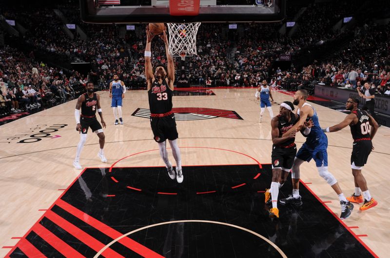 PORTLAND, OR - FEBRUARY 15: Toumani Camara #33 of the Portland Trail Blazers goes up for the rebound during the game against the Minnesota Timberwolves on February 15, 2024 at the Moda Center Arena in Portland, Oregon. NOTE TO USER: User expressly acknowledges and agrees that, by downloading and or using this photograph, user is consenting to the terms and conditions of the Getty Images License Agreement. Mandatory Copyright Notice: Copyright 2024 NBAE (Photo by Cameron Browne/NBAE via Getty Images)