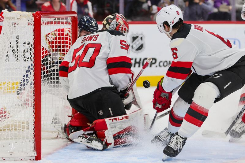 Jan 13, 2024; Sunrise, Florida, USA; New Jersey Devils goaltender Nico Daws (50) makes a save against the Florida Panthers during the second period at Amerant Bank Arena. Mandatory Credit: Sam Navarro-USA TODAY Sports