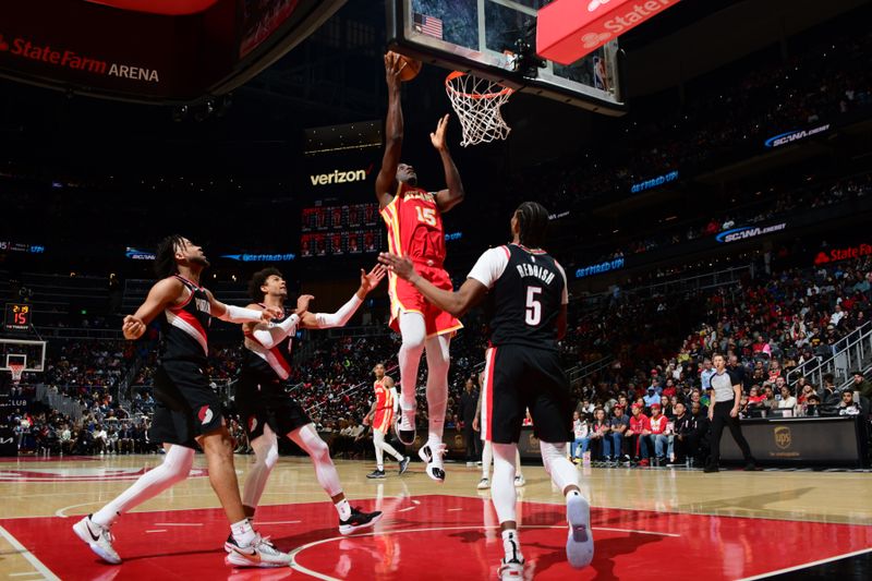 ATLANTA, GA - MARCH 3: Clint Capela #15 of the Atlanta Hawks drives to the basket during the game against the Portland Trail Blazers on March 3, 2023 at State Farm Arena in Atlanta, Georgia.  NOTE TO USER: User expressly acknowledges and agrees that, by downloading and/or using this Photograph, user is consenting to the terms and conditions of the Getty Images License Agreement. Mandatory Copyright Notice: Copyright 2023 NBAE (Photo by Scott Cunningham/NBAE via Getty Images)