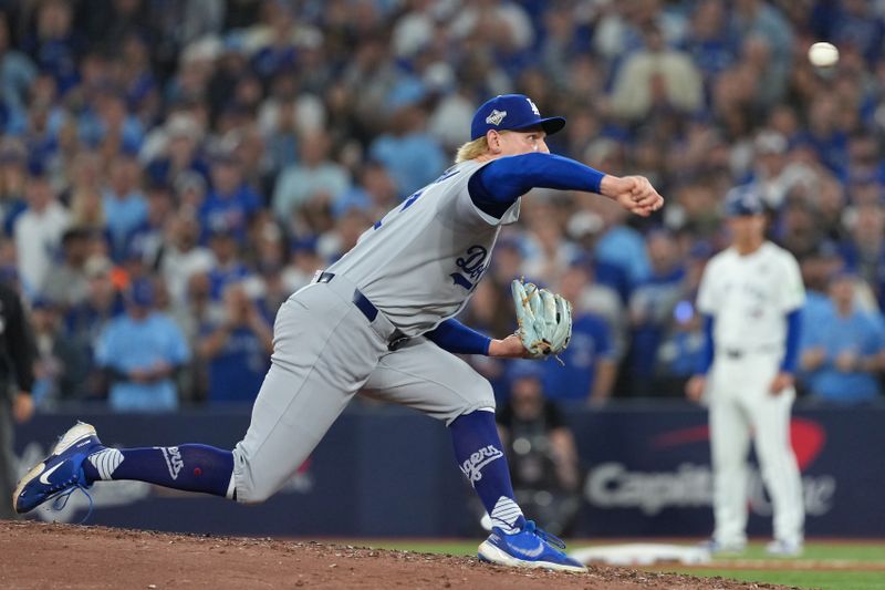 Oct 24, 2025; Toronto, Ontario, CAN; Los Angeles Dodgers pitcher Emmet Sheehan (80) pitches against the Toronto Blue Jays in the sixth inning during game one of the 2025 MLB World Series at Rogers Centre. Mandatory Credit: Nick Turchiaro-Imagn Images