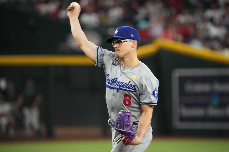 Sep 1, 2024; Phoenix, Arizona, USA; Los Angeles Dodgers third base Enrique Hernández (8) pitches against the Arizona Diamondbacks during the eighth inning at Chase Field. Mandatory Credit: Joe Camporeale-USA TODAY Sports